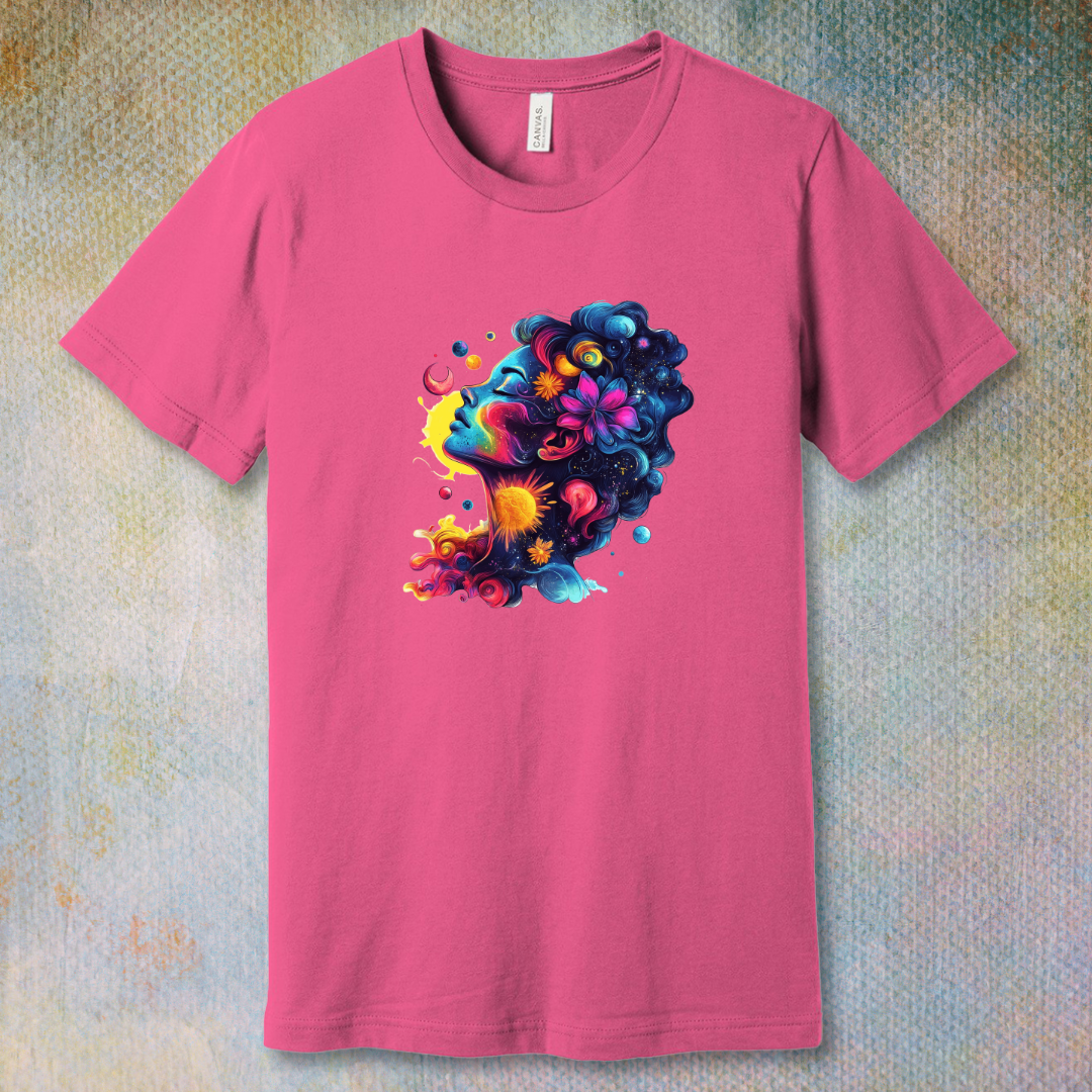Colorful cosmic art T-shirt of a woman's face blending with stars, planets, and swirling energy—representing dreams, imagination, and universal beauty.