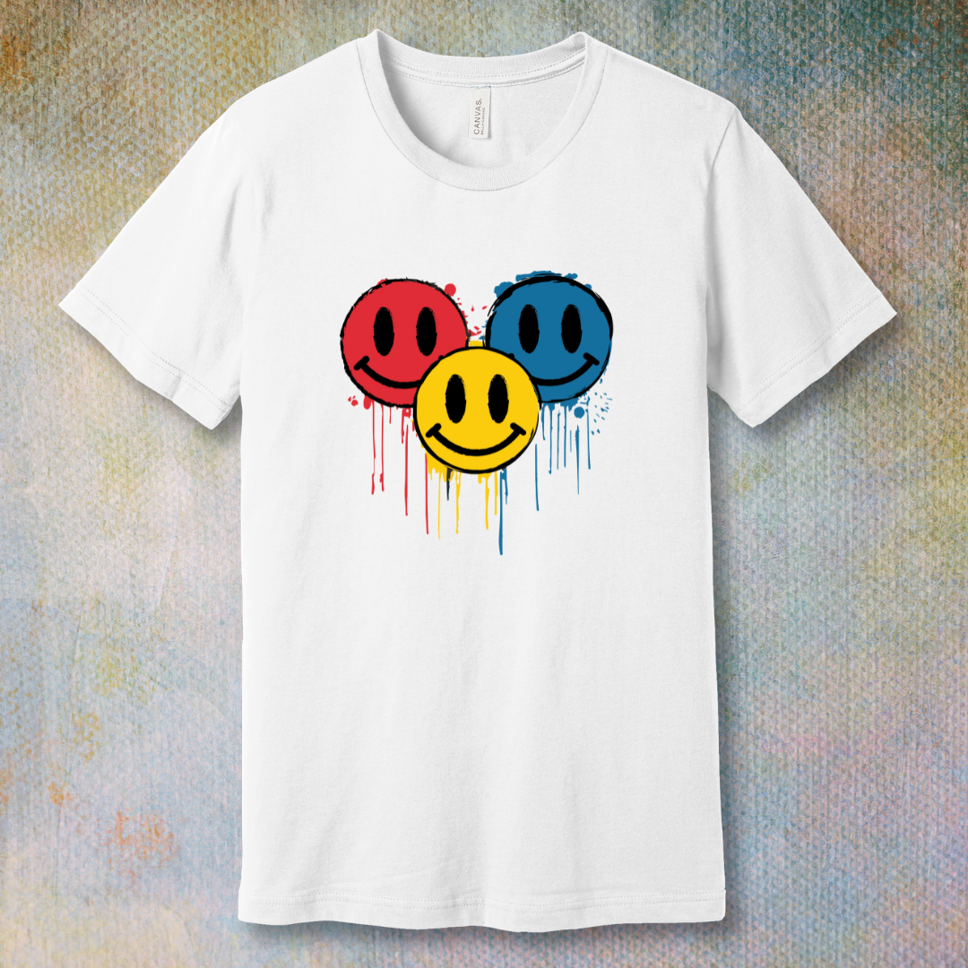 Drip Smile t-shirt — red, yellow, and blue smiley faces dripping paint on white tee