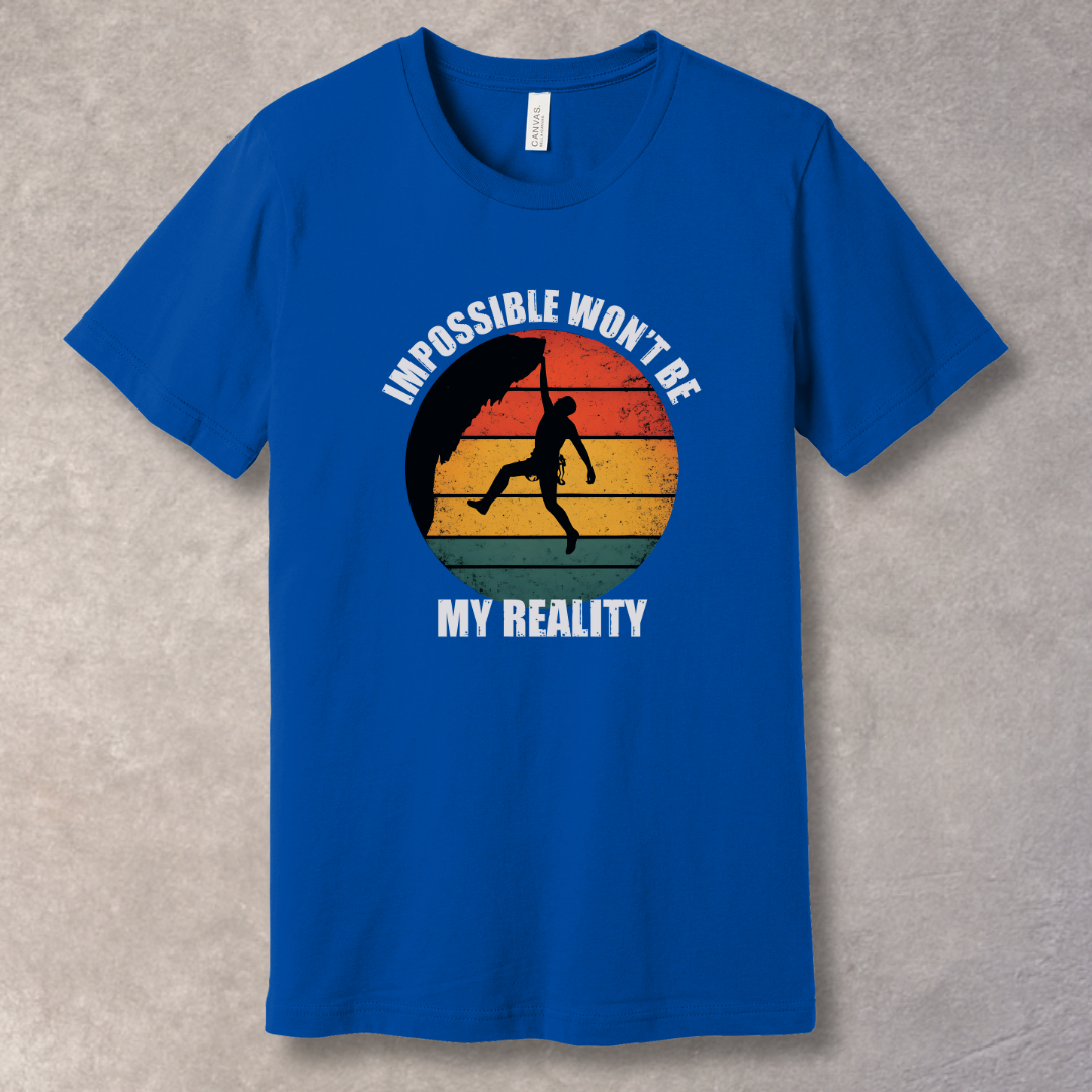 True Royal T-shirt with rock climber silhouette over retro sunset with text “Impossible Won’t Be My Reality”