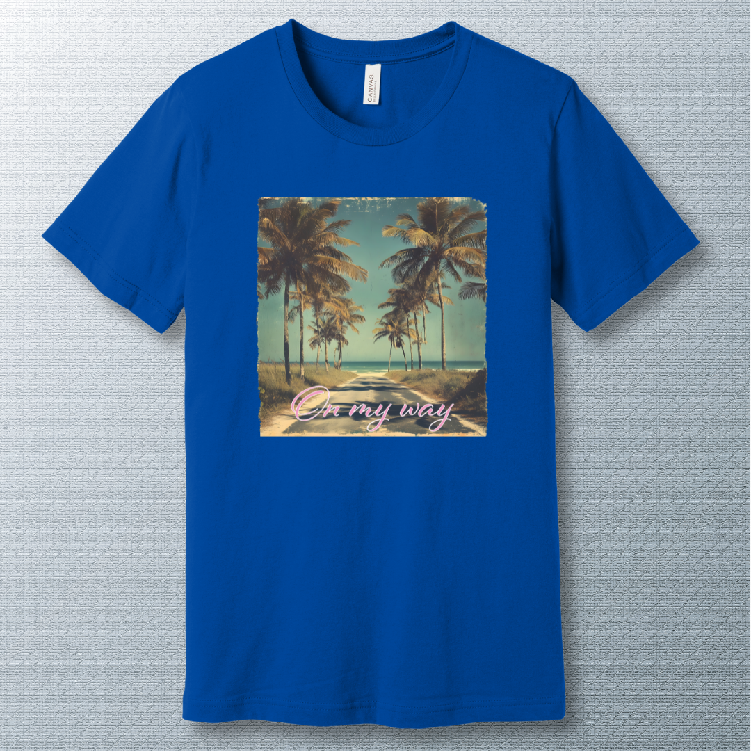 Tropical beach road lined with palm trees under a clear sky, with the phrase "On my way" in pink cursive script — vintage postcard-style design.