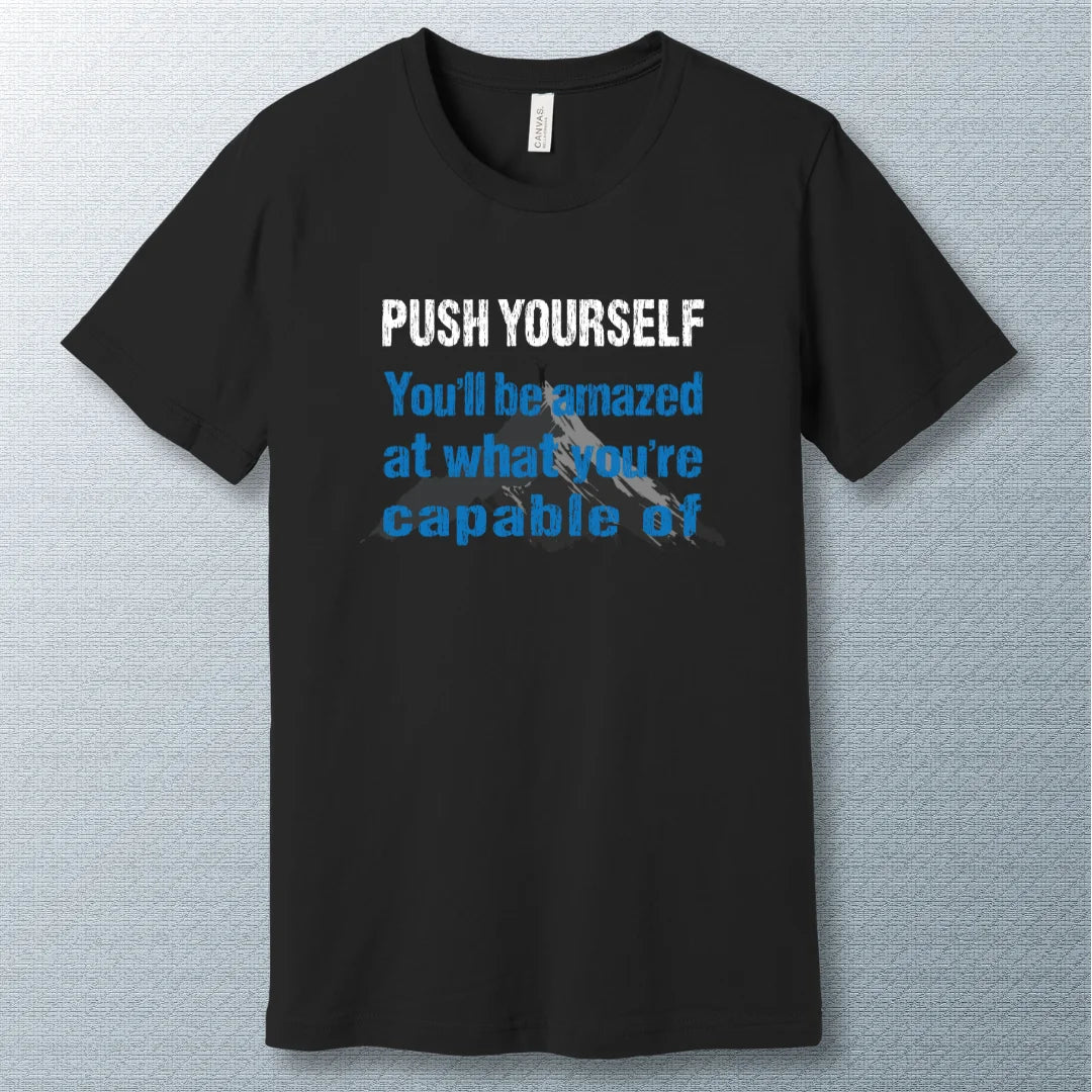 Motivational T-shirt that says "Push Yourself – You’ll be amazed at what you’re capable of" with mountain graphic