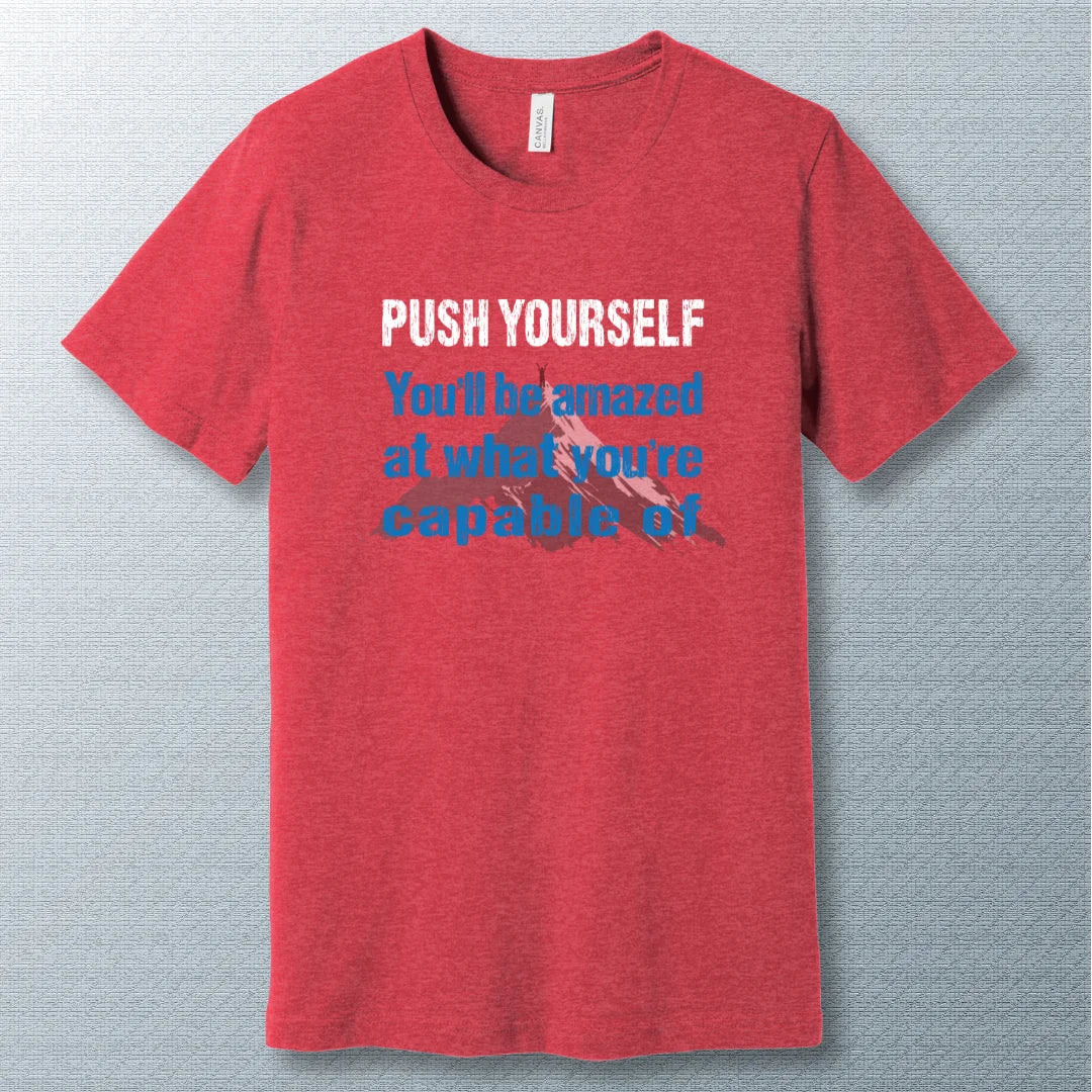 Motivational T-shirt that says "Push Yourself – You’ll be amazed at what you’re capable of" with mountain graphic