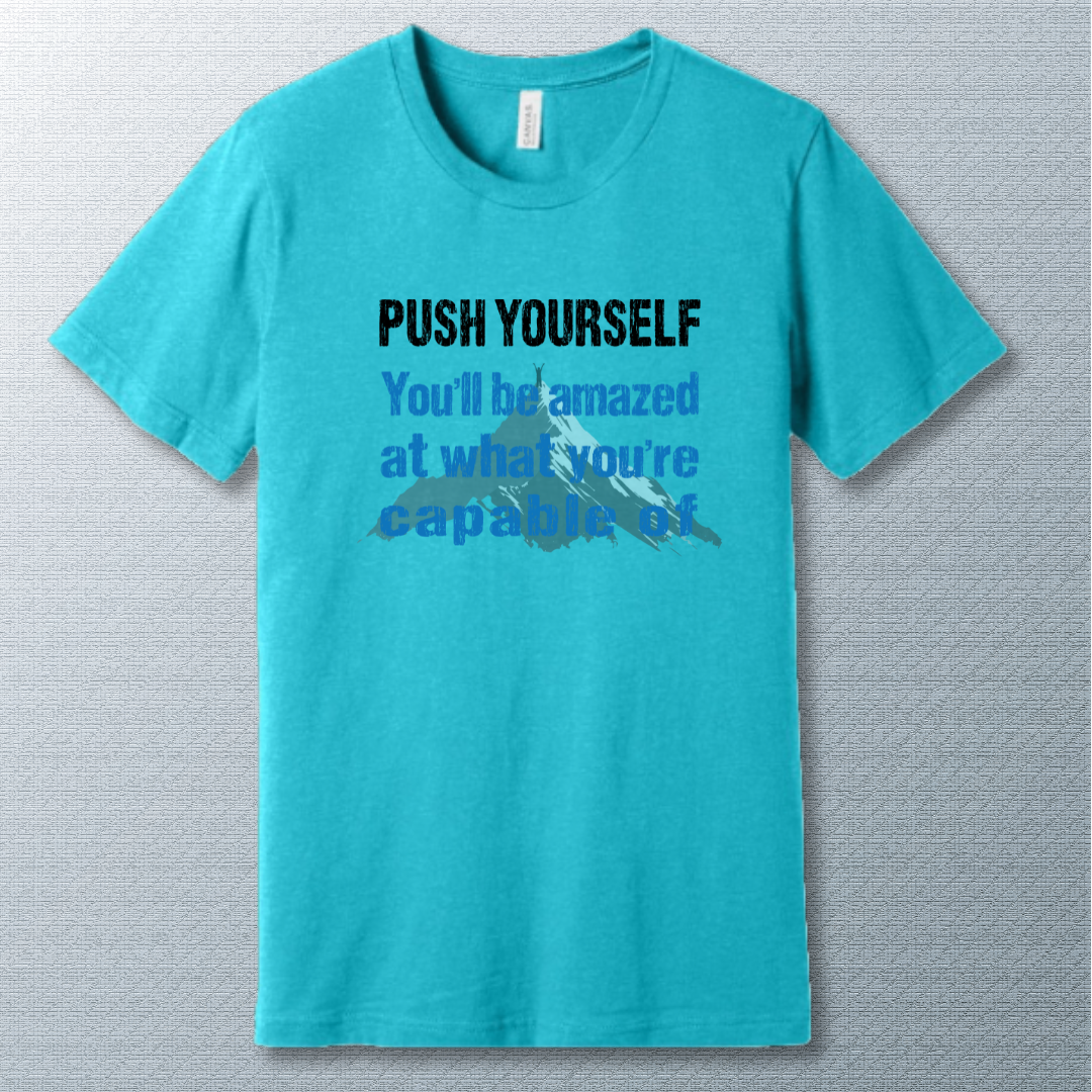 Motivational T-shirt that says "Push Yourself – You’ll be amazed at what you’re capable of" with mountain graphic