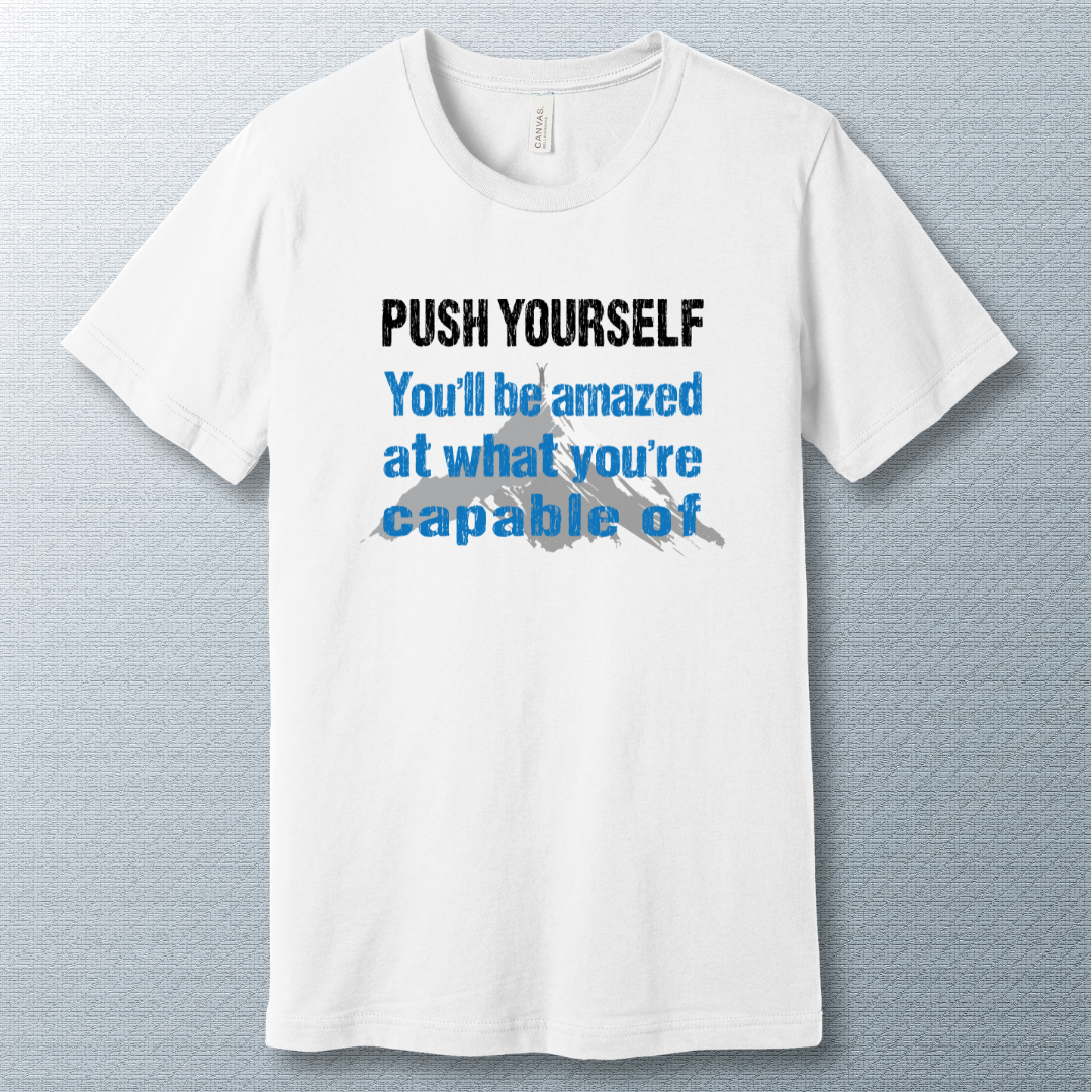 Motivational T-shirt that says "Push Yourself – You’ll be amazed at what you’re capable of" with mountain graphic