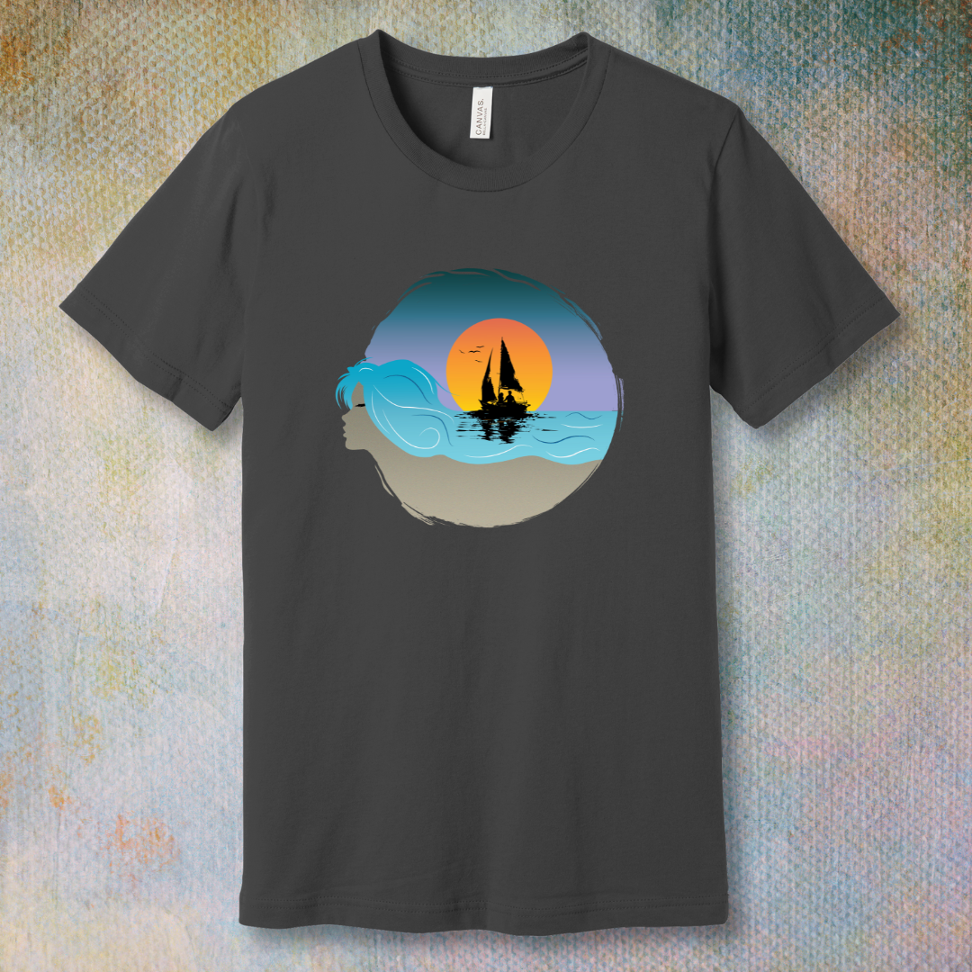 Asphalt T-shirt with sailboat illustration and sunset sky, displayed flat on a soft background
