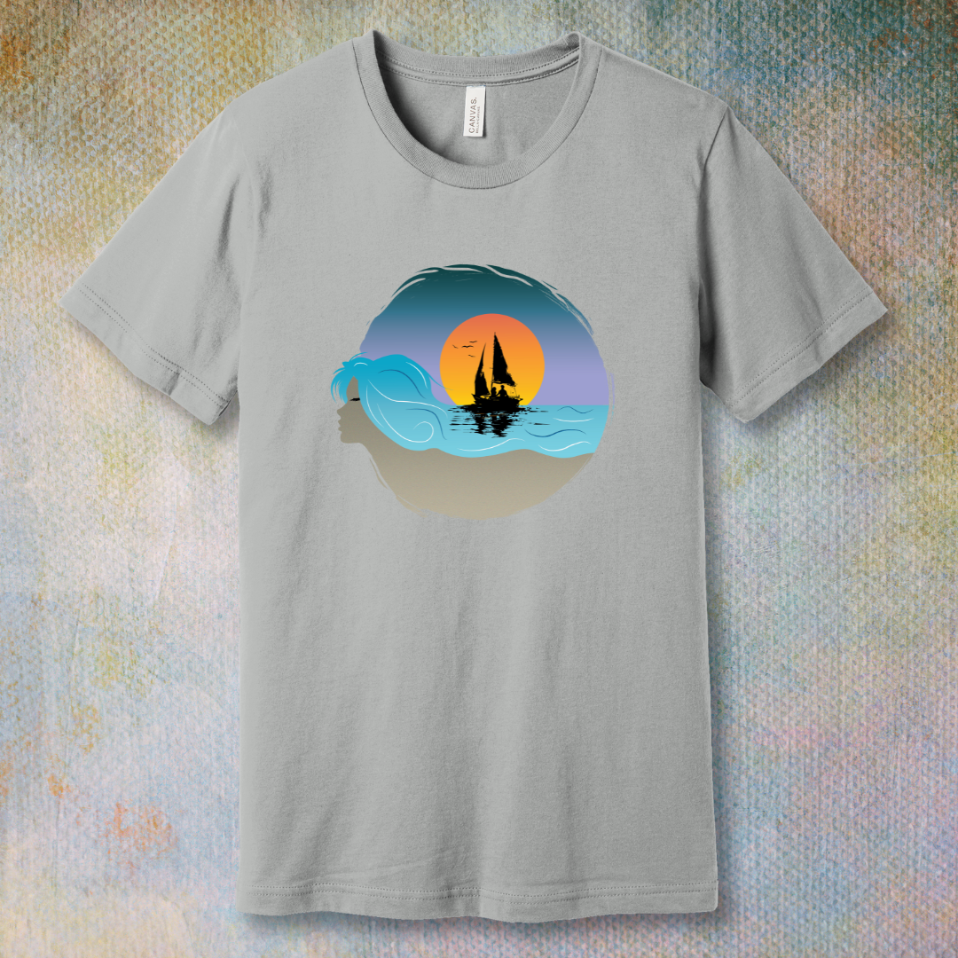 Silver T-shirt with sailboat illustration and sunset sky, displayed flat on a soft background