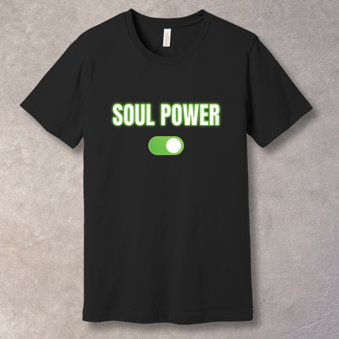 White text “SOUL POWER” with neon green glow above a bright green ON switch on a black T-shirt – motivational graphic tee design.