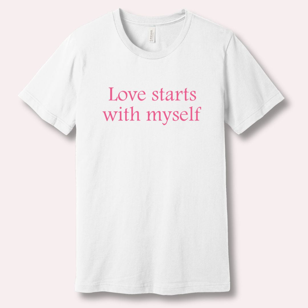 White t-shirt with 'Love starts with myself' text in soft pink