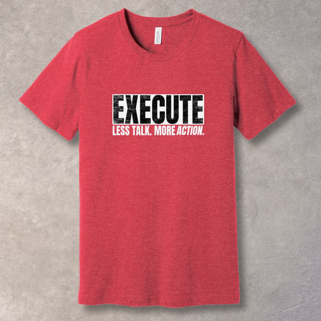 Red unisex T-shirt with bold “EXECUTE” graphic and “Less Talk. More Action.” motivational quote in distressed typography.