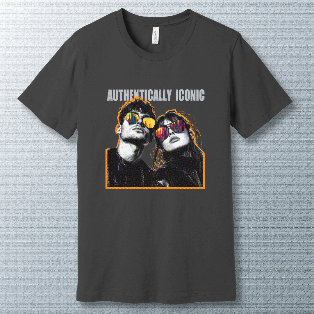 Pop art style design of a confident man and woman wearing sunglasses with colorful city reflections, under the bold text "AUTHENTICALLY ICONIC" – T-shirt.