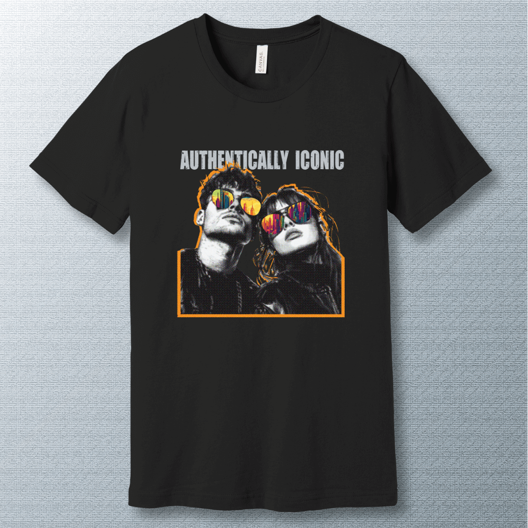 Pop art style design of a confident man and woman wearing sunglasses with colorful city reflections, under the bold text "AUTHENTICALLY ICONIC" – T-shirt.