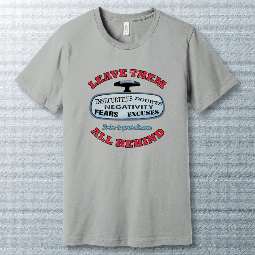 Silver t-shirt with bold design showing rear-view mirror and motivational words "Leave them all behind" – insecurities, doubts, fears, excuses