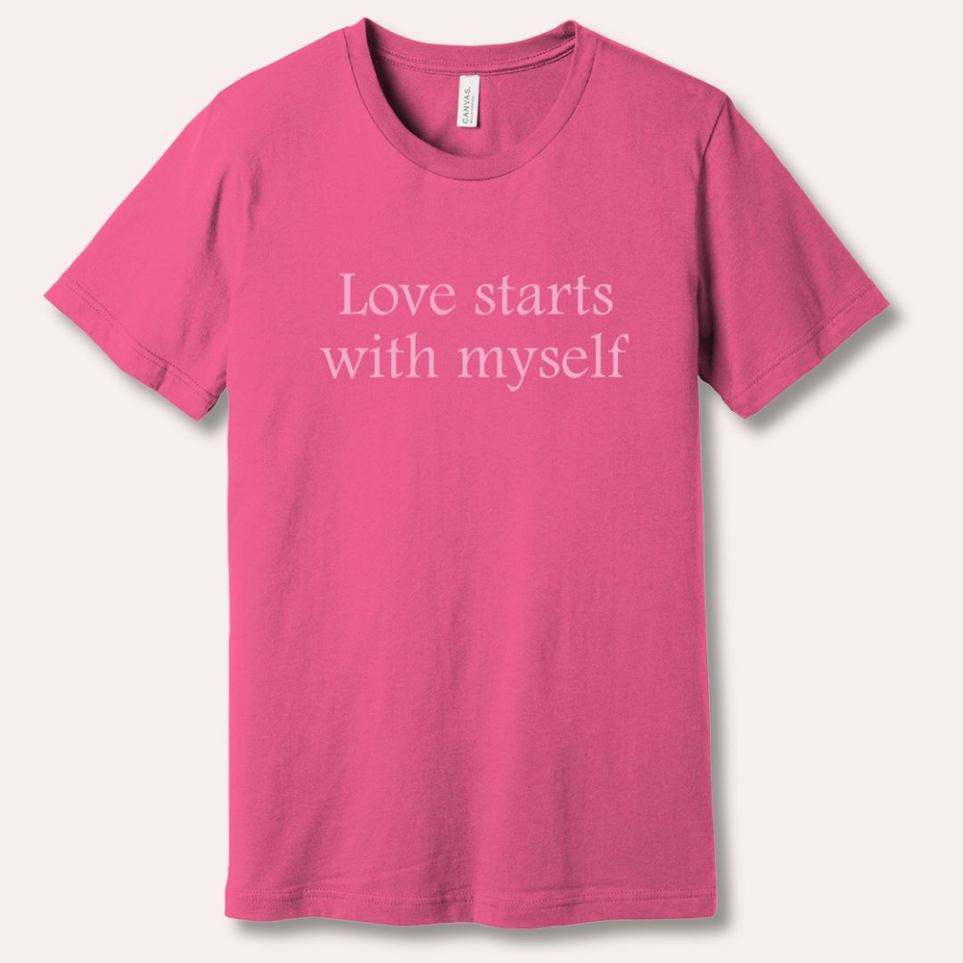 Charity Pink t-shirt with 'Love starts with myself' text in soft pink